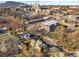 Overhead view of a house with a large city in the background on a bright sunny day at 192 Chicopee Dr, Marietta, GA 30060