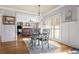 Dining area opens to living room with hardwood floors and neutral colors at 192 Chicopee Dr, Marietta, GA 30060