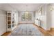 Dining room features hardwood floors, white wainscoting, and natural light at 192 Chicopee Dr, Marietta, GA 30060