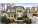 Inviting two-story home featuring a cozy front porch, manicured landscaping, and attached two-car garage at 192 Chicopee Dr, Marietta, GA 30060