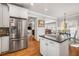 Stylish kitchen with white cabinets, black countertops, and stainless steel appliances at 192 Chicopee Dr, Marietta, GA 30060