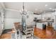 Bright kitchen with white cabinets, granite countertops, and stainless steel appliances at 192 Chicopee Dr, Marietta, GA 30060