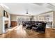 Bright living room featuring hardwood floors, fireplace, and a large sectional sofa at 192 Chicopee Dr, Marietta, GA 30060