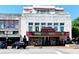The Strand theater front shows open architecture, and closed for Covid at 192 Chicopee Dr, Marietta, GA 30060