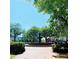 Scenic town park featuring a classic water fountain, surrounded by lush trees and walking paths at 192 Chicopee Dr, Marietta, GA 30060