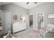 Well-organized Bedroom with changing table dresser, closet, and playful decor at 2303 Waters Edge Trl, Roswell, GA 30075