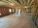 Unfinished basement with exposed framing at 3426 Olivia Grace Way, Dacula, GA 30019