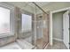 Tiled shower and bathtub in the bathroom at 3426 Olivia Grace Way, Dacula, GA 30019