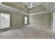 Bedroom featuring carpet flooring, ceiling fan, and natural light at 3426 Olivia Grace Way, Dacula, GA 30019