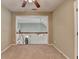 Bedroom with neutral carpet and staircase overlooking downstairs at 3426 Olivia Grace Way, Dacula, GA 30019