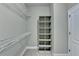 Walk-in closet with shelves at 3426 Olivia Grace Way, Dacula, GA 30019