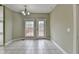 Bright breakfast nook featuring tile floors and access to an outdoor deck through a glass door at 3426 Olivia Grace Way, Dacula, GA 30019