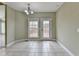 Bright breakfast nook featuring tile floors and access to an outdoor deck through a glass door at 3426 Olivia Grace Way, Dacula, GA 30019