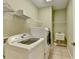 Laundry room featuring tile flooring, washer and dryer at 3426 Olivia Grace Way, Dacula, GA 30019
