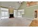 Spacious living room features a vaulted ceiling, fireplace, and lots of natural light at 3426 Olivia Grace Way, Dacula, GA 30019