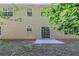 The home's backyard features a well-maintained lawn and a small patio area, perfect for outdoor relaxation at 6285 Polar Fox Ct, Riverdale, GA 30296