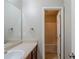 Bathroom featuring a vanity, mirror, and walk-in shower at 6285 Polar Fox Ct, Riverdale, GA 30296