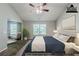 Staged bedroom features large windows and a seating area, creating a relaxing and inviting space at 6285 Polar Fox Ct, Riverdale, GA 30296