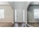 Inviting entryway with hardwood-style floors and lots of natural light at 6285 Polar Fox Ct, Riverdale, GA 30296
