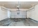 Spacious garage with concrete floors and an automatic door at 6285 Polar Fox Ct, Riverdale, GA 30296