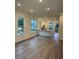 Bright, open-concept living space featuring hardwood floors and modern windows at 101 Pearl St, Woodstock, GA 30188