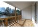 A relaxing wooden porch with natural light and a view of the outdoors at 101 Pearl St, Woodstock, GA 30188