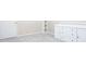 Bedroom featuring carpet flooring, a white dresser and trim at 1220 Wade Green Nw Cir, Acworth, GA 30102