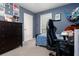 bedroom with gaming chair, bed, and dresser offering ample storage space at 1220 Wade Green Nw Cir, Acworth, GA 30102