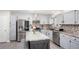 Bright kitchen featuring stainless steel appliances, gray cabinets and granite counters at 1220 Wade Green Nw Cir, Acworth, GA 30102