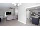 Open-concept living space with wood flooring seamlessly connecting the living room and kitchen at 1220 Wade Green Nw Cir, Acworth, GA 30102