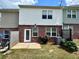Private backyard featuring a patio, lush lawn, and tidy landscaping, perfect for outdoor living at 1606 Larkspur Trl, Conyers, GA 30012