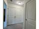 Hallway with a closet and doorway at 1606 Larkspur Trl, Conyers, GA 30012