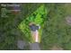 Aerial view of the wooded lot at 5200 Beechwood Forest Court in Lithonia, GA; it's nearly 0.7 acres at 5200 Beechwood Forest Ct, Lithonia, GA 30038