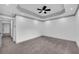 Bedroom featuring gray carpet, gray trim, ceiling fan and recessed lighting at 5200 Beechwood Forest Ct, Lithonia, GA 30038