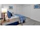 Well-lit bedroom featuring a modern color scheme, comfortable bed, and ample storage at 54 Mildred Ct, Dallas, GA 30157
