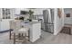 Modern kitchen includes stainless steel appliances, granite countertops, and eat-in breakfast bar at 54 Mildred Ct, Dallas, GA 30157