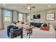 Inviting living room featuring stylish decor, comfortable seating, and abundant natural light at 405 Newland Way, Acworth, GA 30102