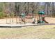 Playground with swings and slides in the Red Top Mountain community at 405 Newland Way, Acworth, GA 30102