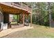 Backyard with deck, stairs, sandbox, and a yard for to enjoy at 6069 Queens River Dr, Mableton, GA 30126