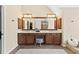 Bathroom features a double vanity, tiled floors, and a soaking tub at 6069 Queens River Dr, Mableton, GA 30126