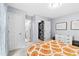 Bright bedroom with large windows, closet space, and colorful retro decor at 6069 Queens River Dr, Mableton, GA 30126