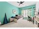 Cozy bedroom with lots of natural light, modern decor, and carpeted floors at 6069 Queens River Dr, Mableton, GA 30126