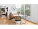 Charming breakfast nook with bright light and a view of a tree-filled back yard at 6069 Queens River Dr, Mableton, GA 30126