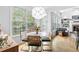 Eat-in kitchen area featuring a breakfast nook with bright natural light and modern decor at 6069 Queens River Dr, Mableton, GA 30126