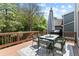 Outdoor deck with dining table and chair set, perfect for entertaining at 6069 Queens River Dr, Mableton, GA 30126