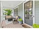 Inviting front porch with seating, perfect for enjoying the outdoors at 6069 Queens River Dr, Mableton, GA 30126