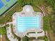 Overhead view of the community pool, surrounded by lounge chairs and lush landscaping at 6069 Queens River Dr, Mableton, GA 30126