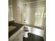 Bathroom featuring a tub-shower combo and vanity at 6446 Grey Fox Way, Riverdale, GA 30296