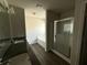 Bathroom featuring double vanity, granite countertops, shower, and soaking tub at 6446 Grey Fox Way, Riverdale, GA 30296