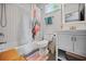 Clean, updated bathroom featuring a shower-tub combo and a modern vanity at 670 Parker Ave, Decatur, GA 30032